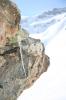 Stalactite sur fond de pentes crames